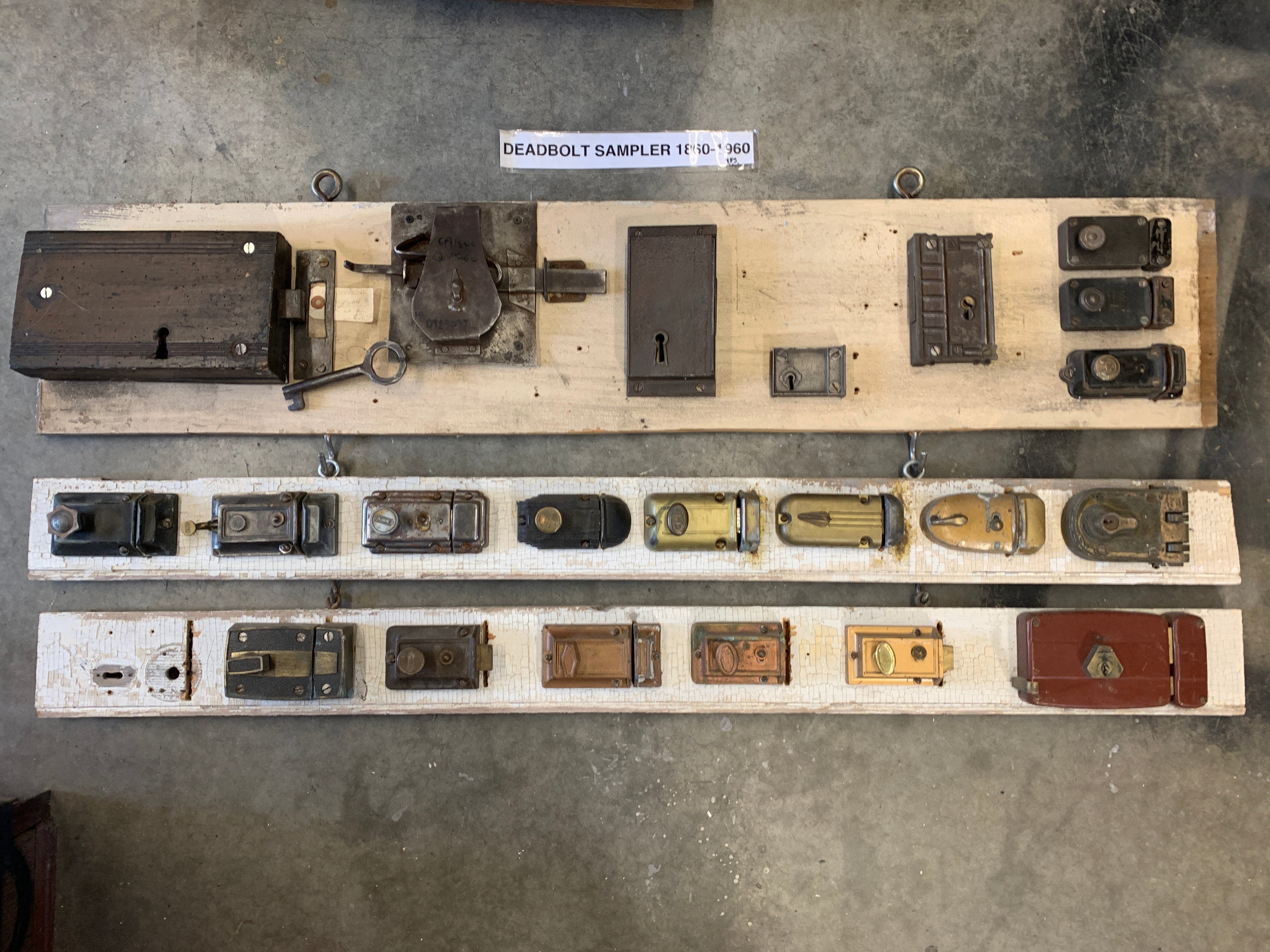 Deadbolt Sampler showing different styles from 1860 to 1960