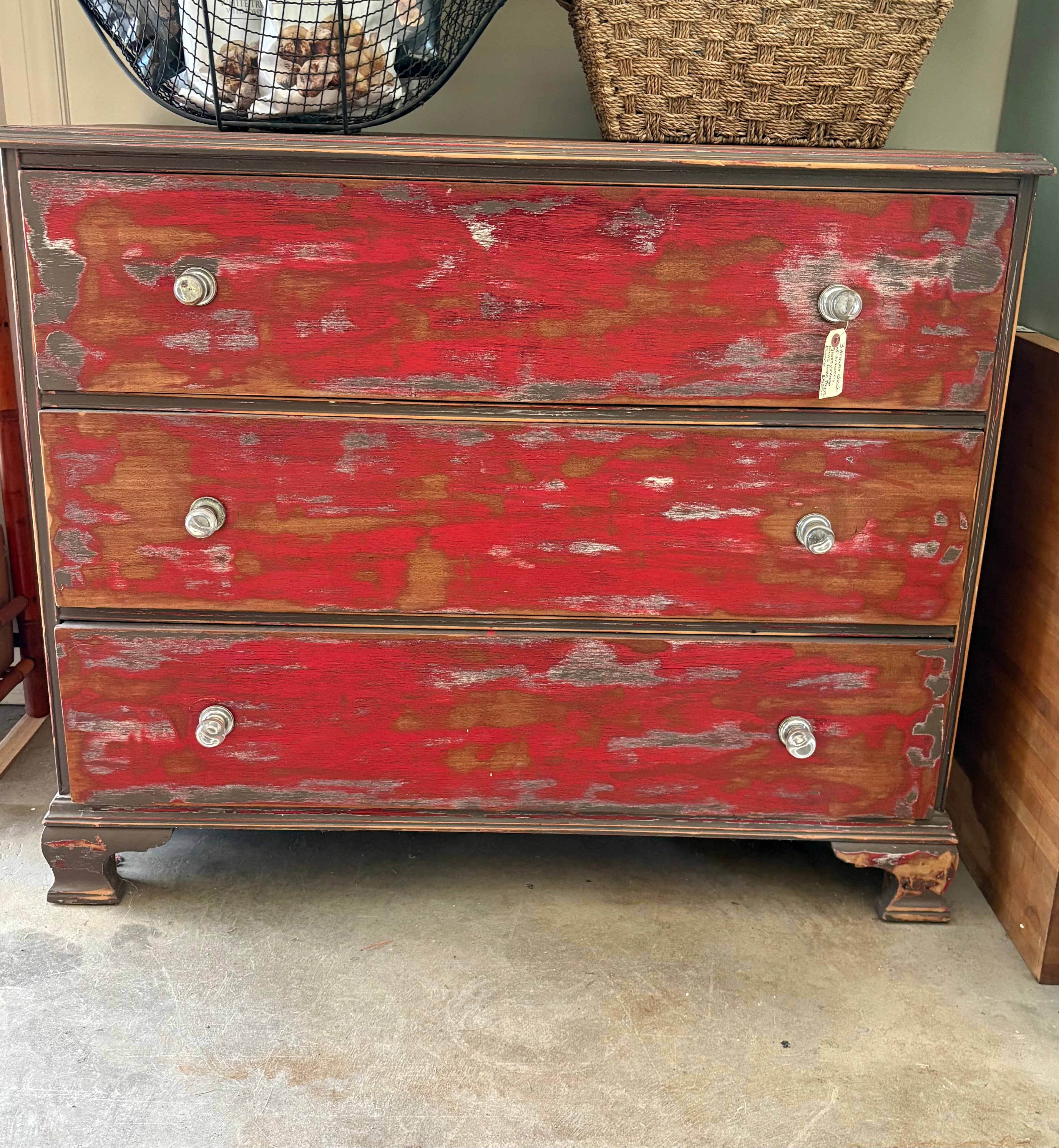 Red painted dresser.