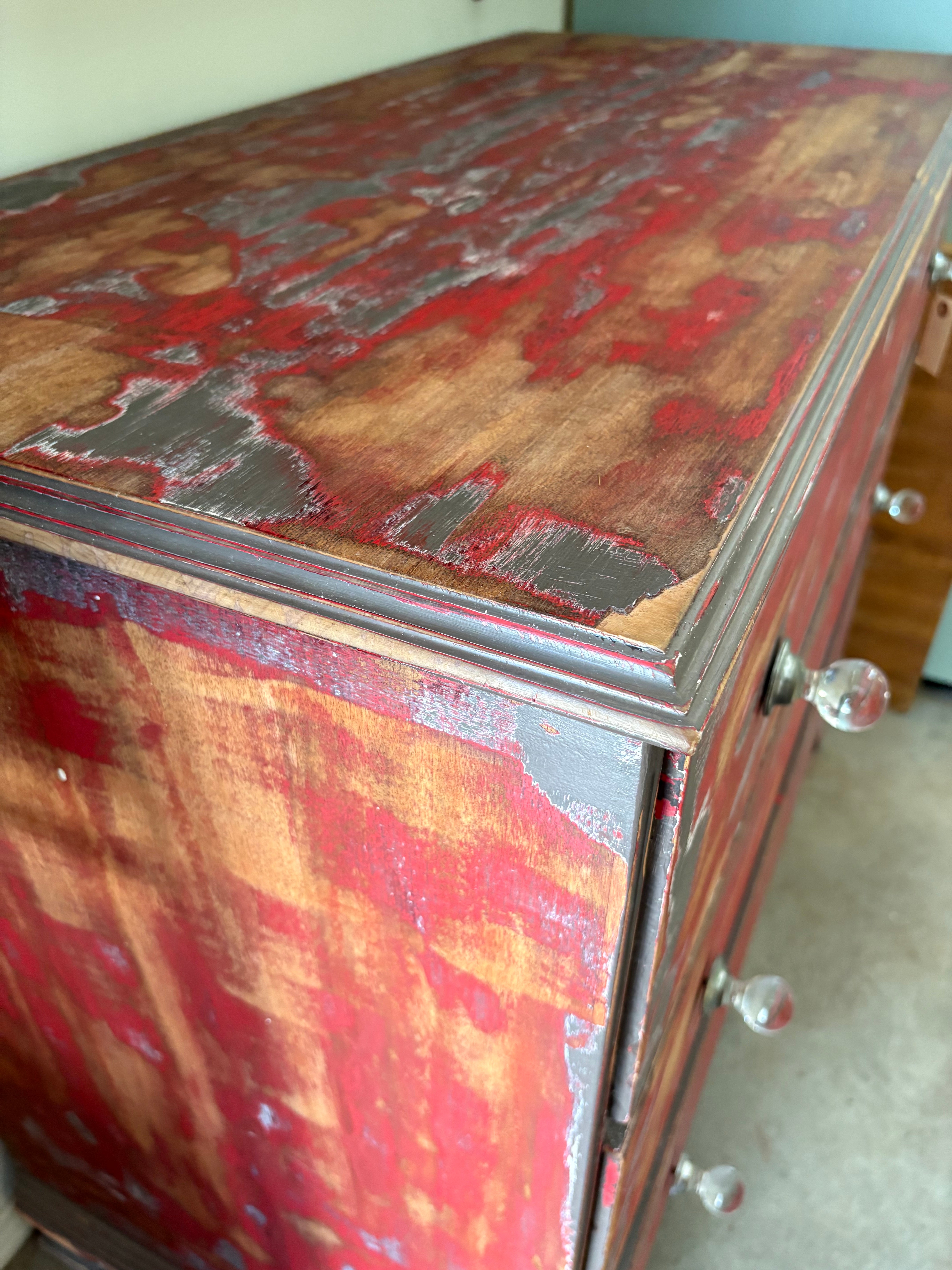 Red painted dresser.