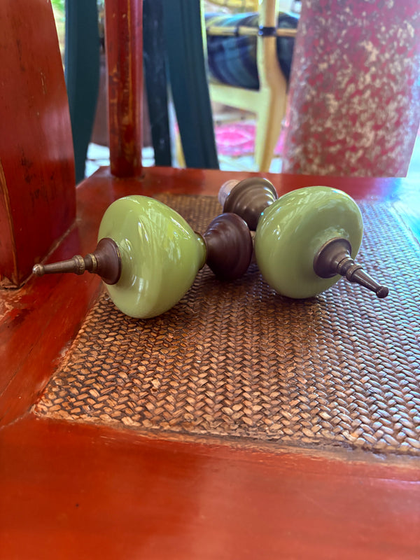Pair of green cased glass curtain finials