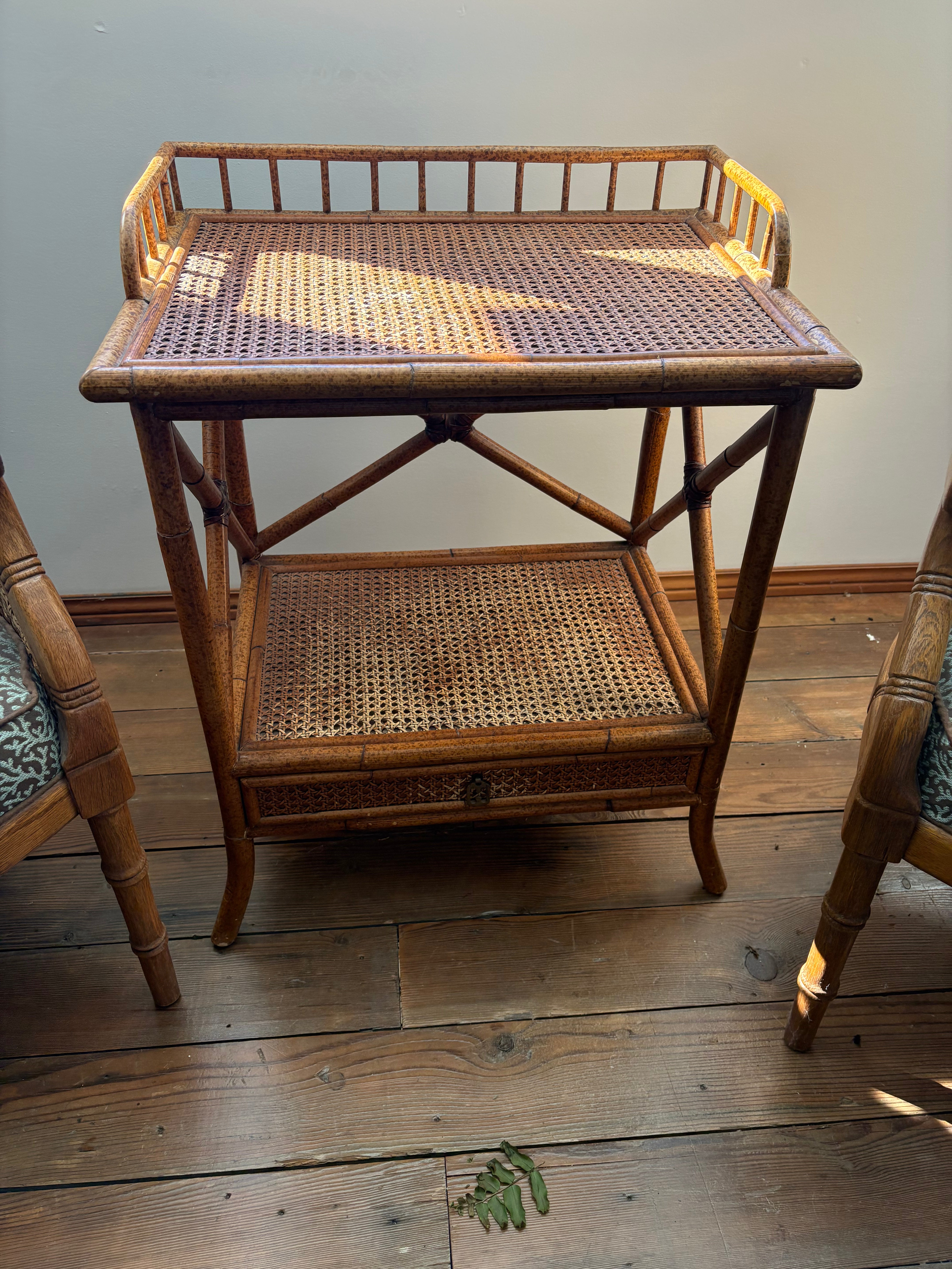 Set of barrel back faux bamboo chairs and matching table