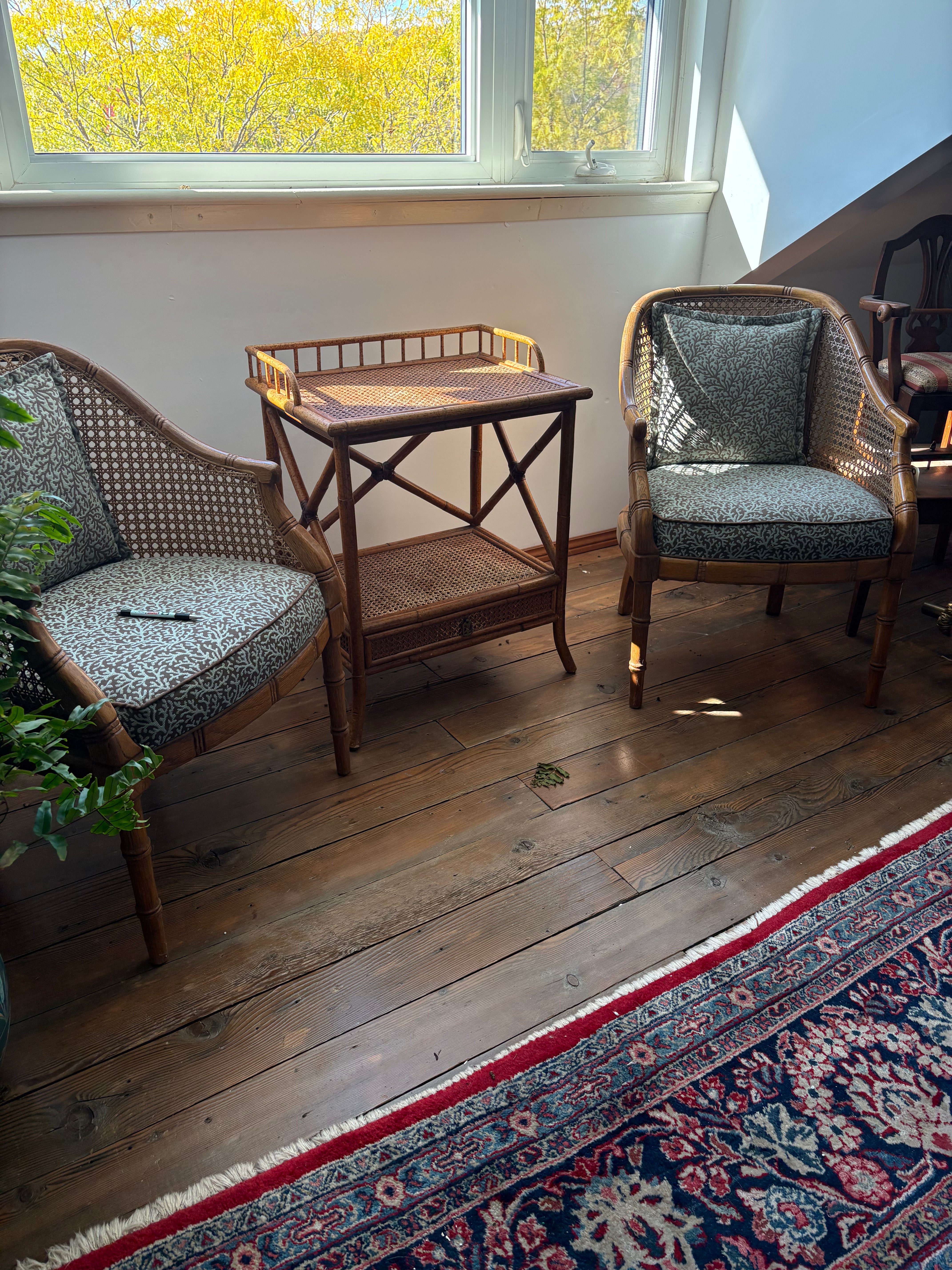 Set of barrel back faux bamboo chairs and matching table