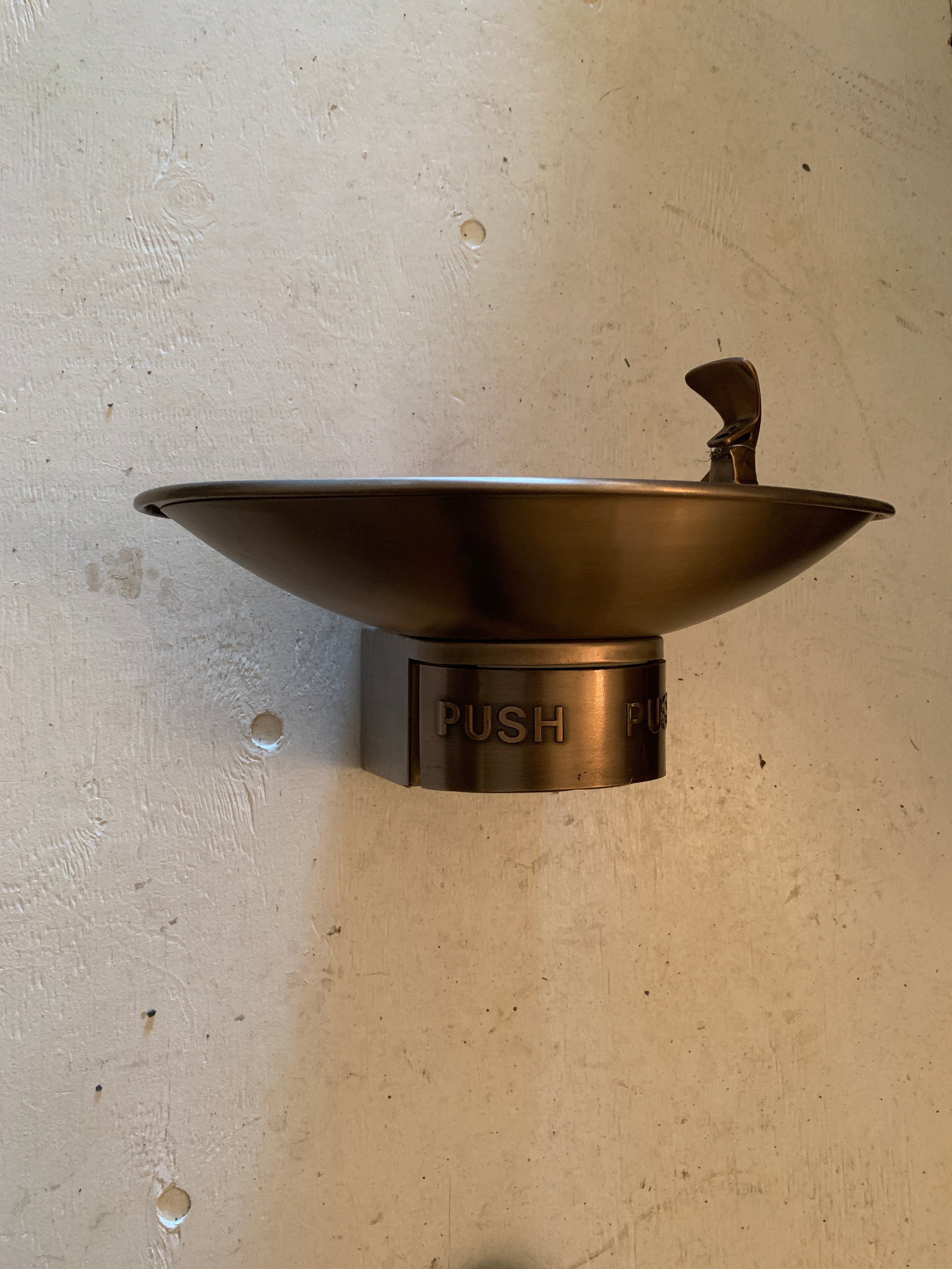 Wall-mount, oval-bowl, stainless steel drinking fountain  ca. 20th century