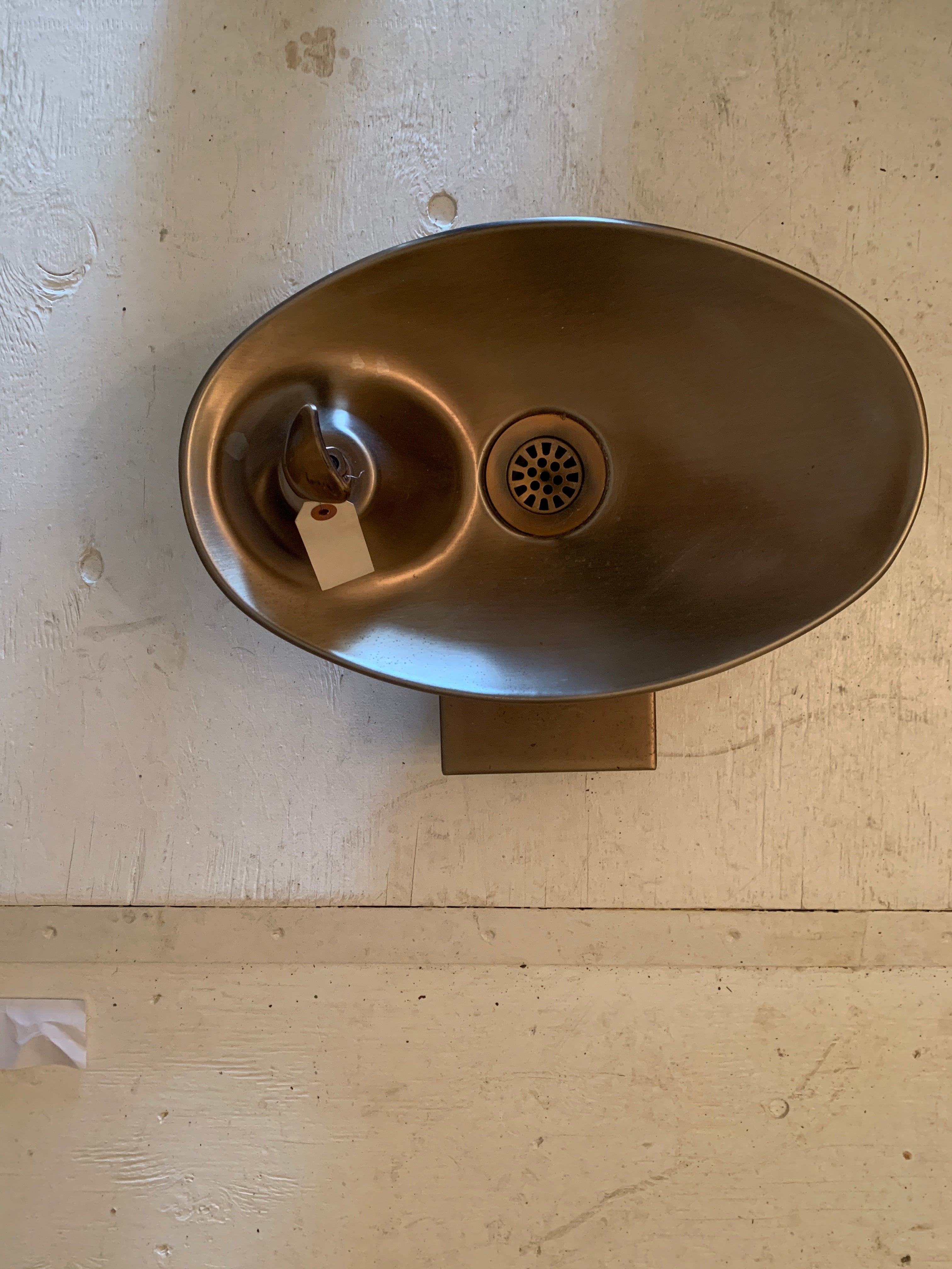 Wall-mount, oval-bowl, stainless steel drinking fountain  ca. 20th century