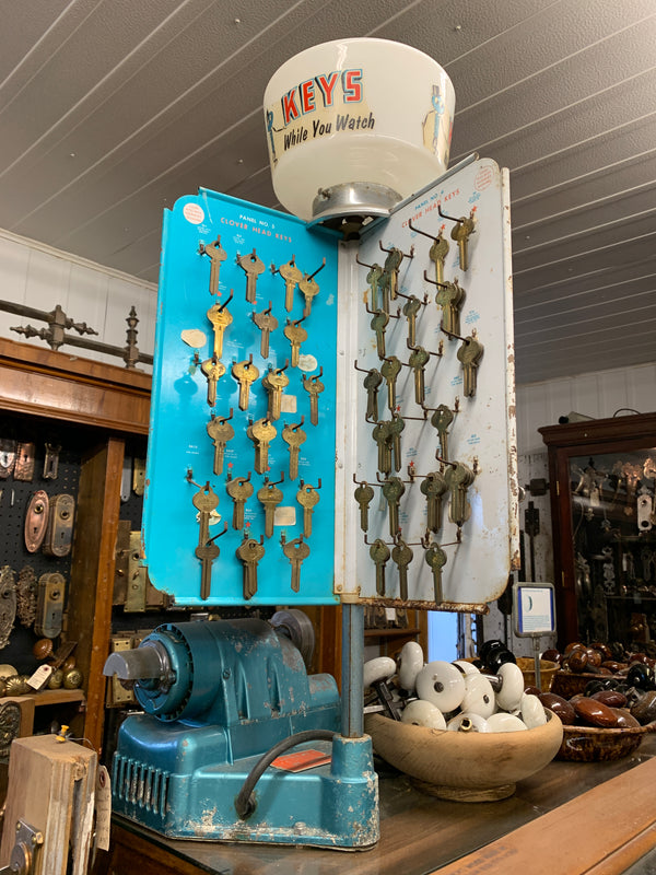 Electric Key Cutter and Display Rack. ca. 1950s