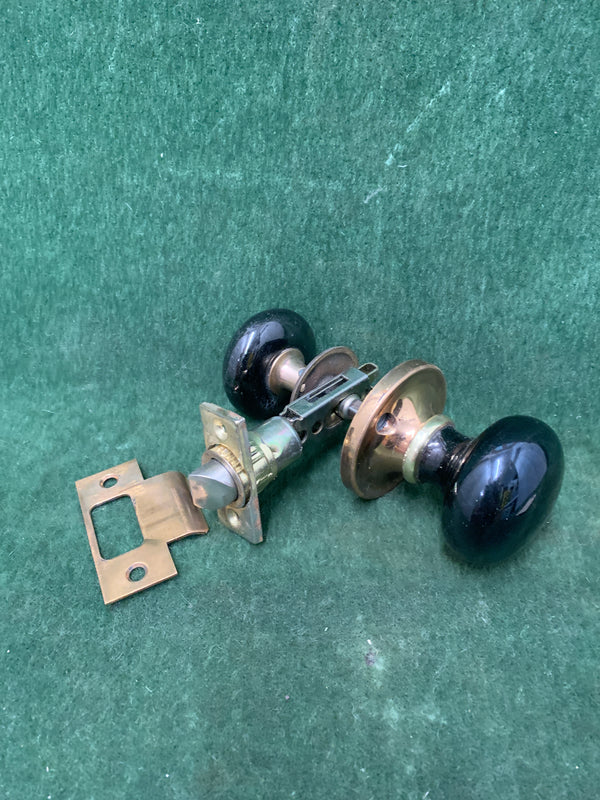 Oversized Black Porcelain Knobs, Brass Rosettes and tube latch  ca. 1870s.  (1840-1940)