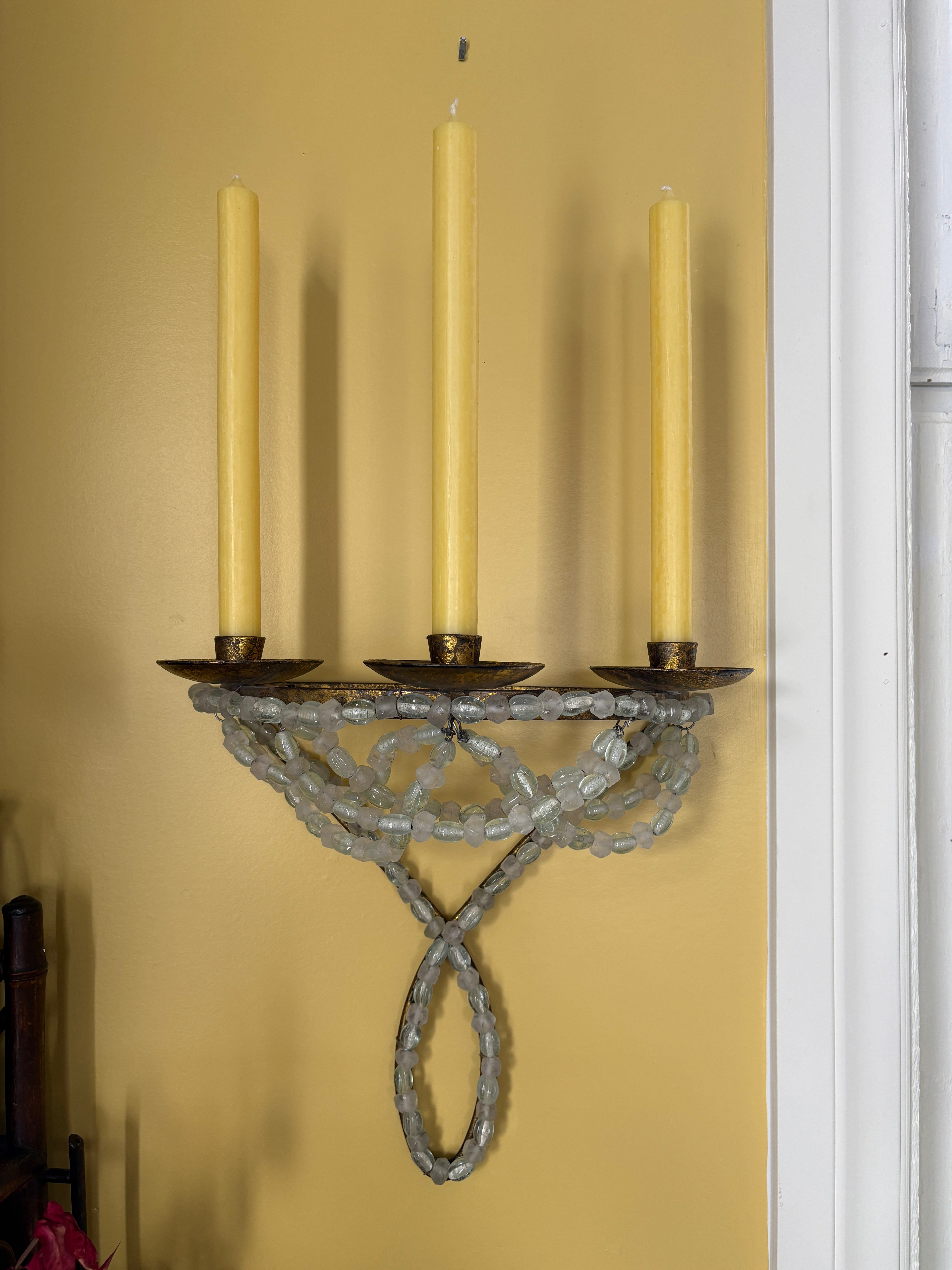 Pair of Italian brass candle sconces with beaded glass embelishments.