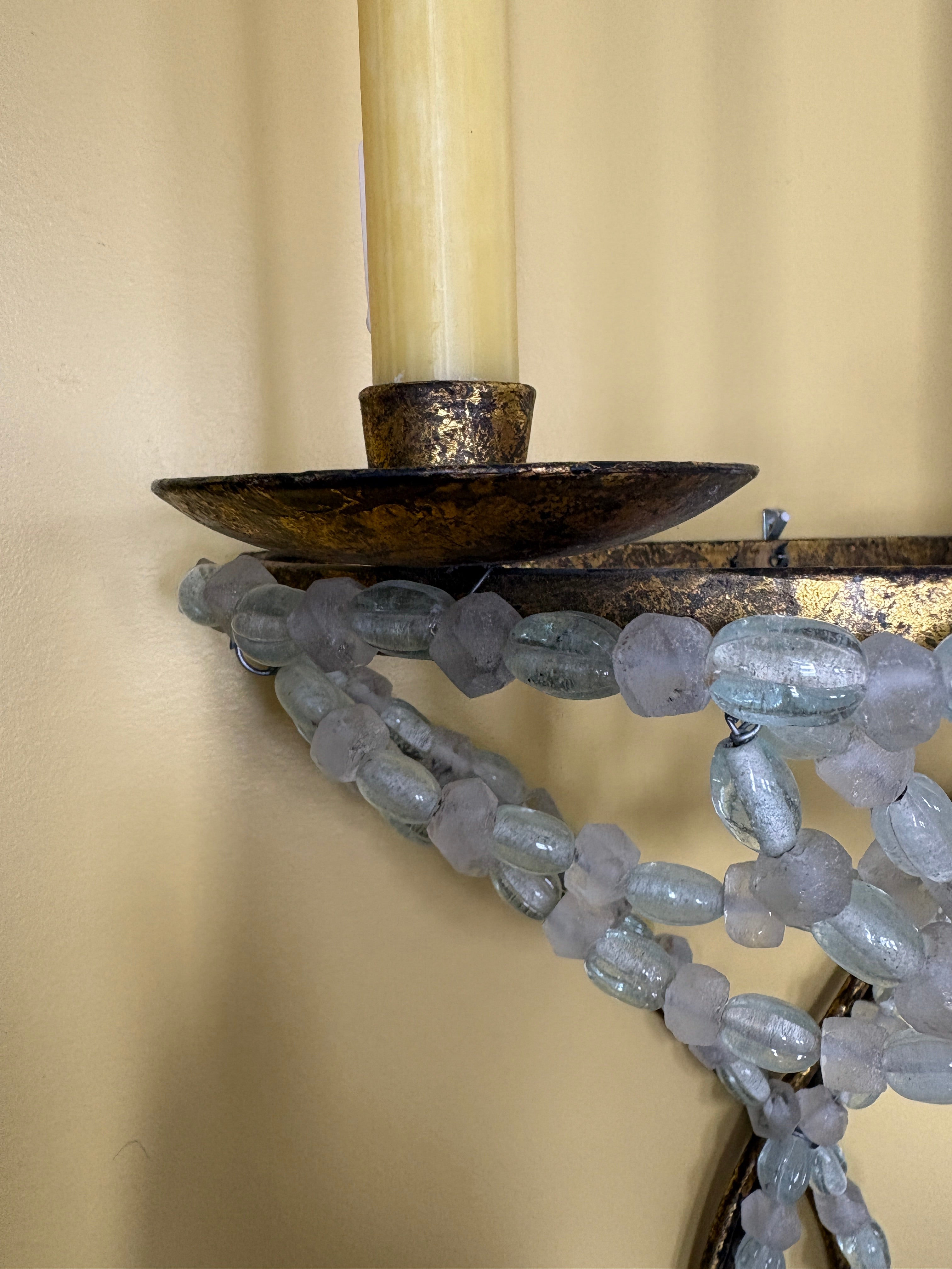 Pair of Italian brass candle sconces with beaded glass embelishments.