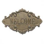 Cast iron welcome sign.