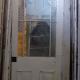Beautiful antique oversize glazed exterior entry door with nine glass lites/panes
