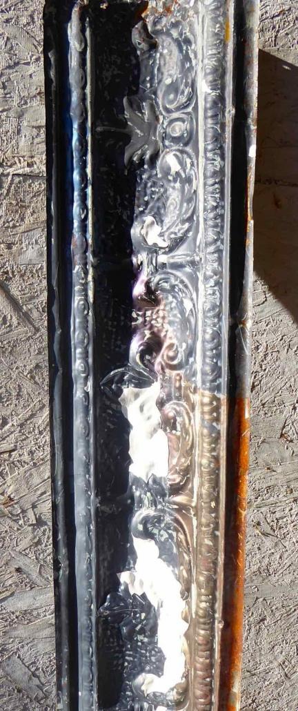 Salvaged wide tin ceiling trim
