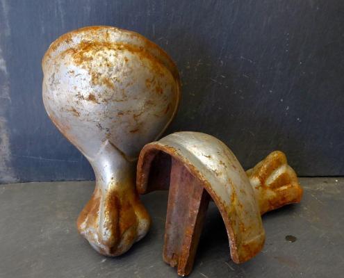 Antique bathtub claw feet on ball