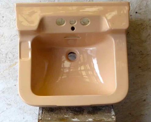 Peach coloured vintage bathroom sink