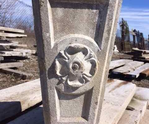 Antique keystone with decorative flower motif