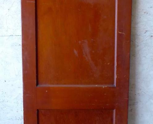 Antique single solid two panel interior wood door with swing pivot