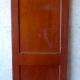Antique single solid two panel interior wood door with swing pivot