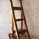 Very old industrial hand cart, all original parts. Made of wood with cast metal wheels.