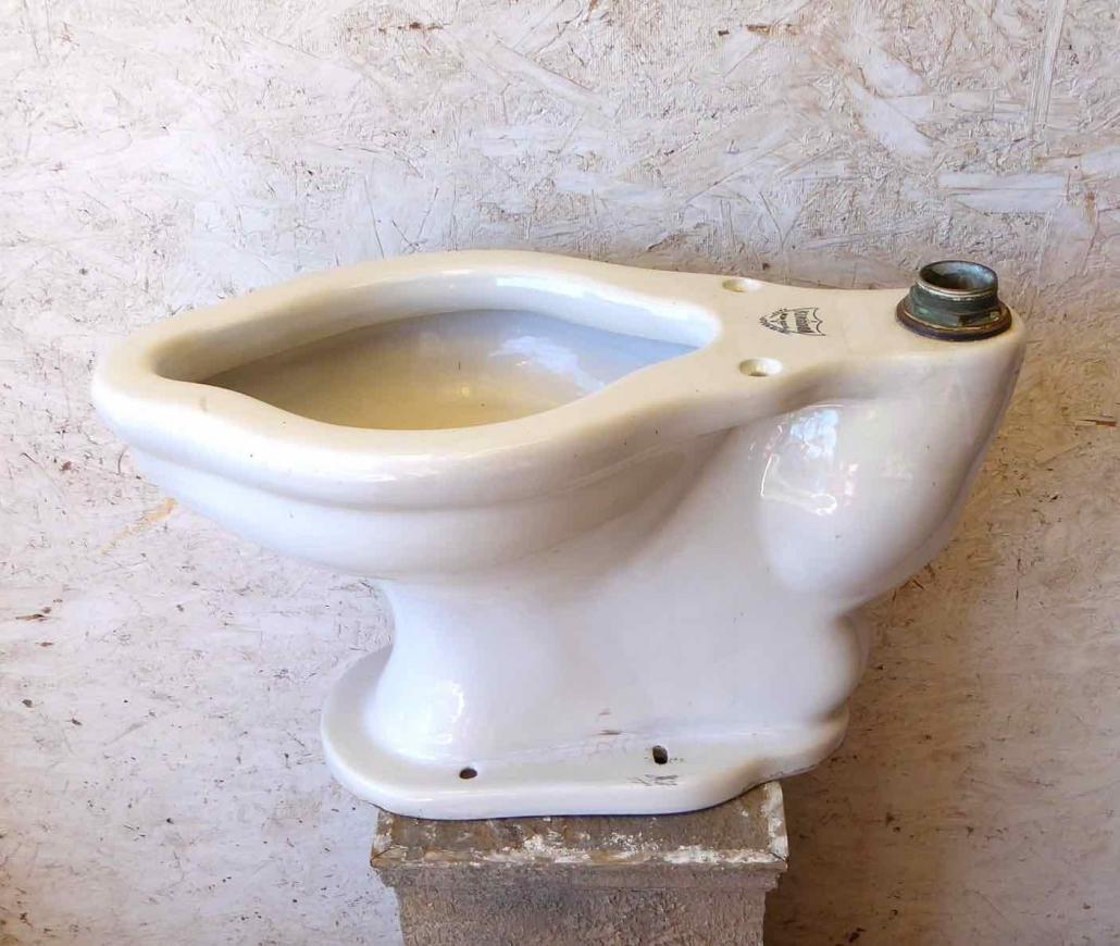 Antique porcelain toilet, "Non-Soil" model made by Kingdon. Patented February 21, 1911. Prop only. 