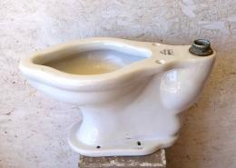 Antique porcelain toilet, "Non-Soil" model made by Kingdon. Patented February 21, 1911. Prop only. 
