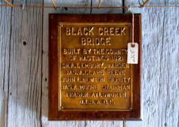 Antique sign for Black Creek Bridge in Hastings county