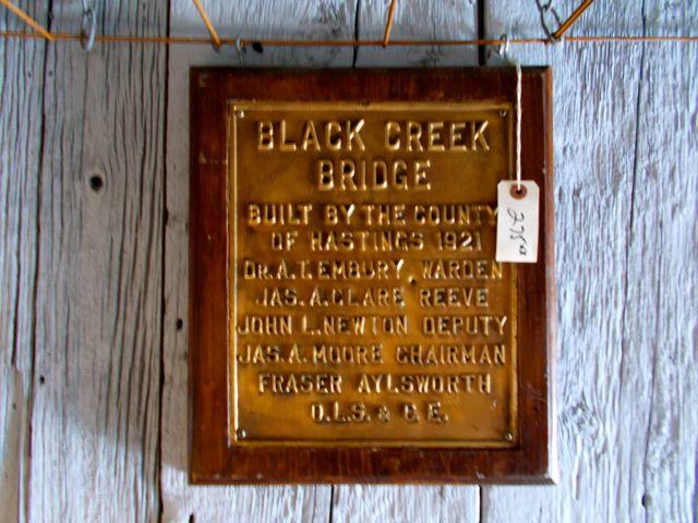 Antique sign for Black Creek Bridge in Hastings county