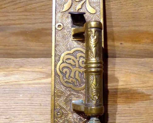 Eastlake style cast brass thumblatch entry set with extraordinary detailed design work.