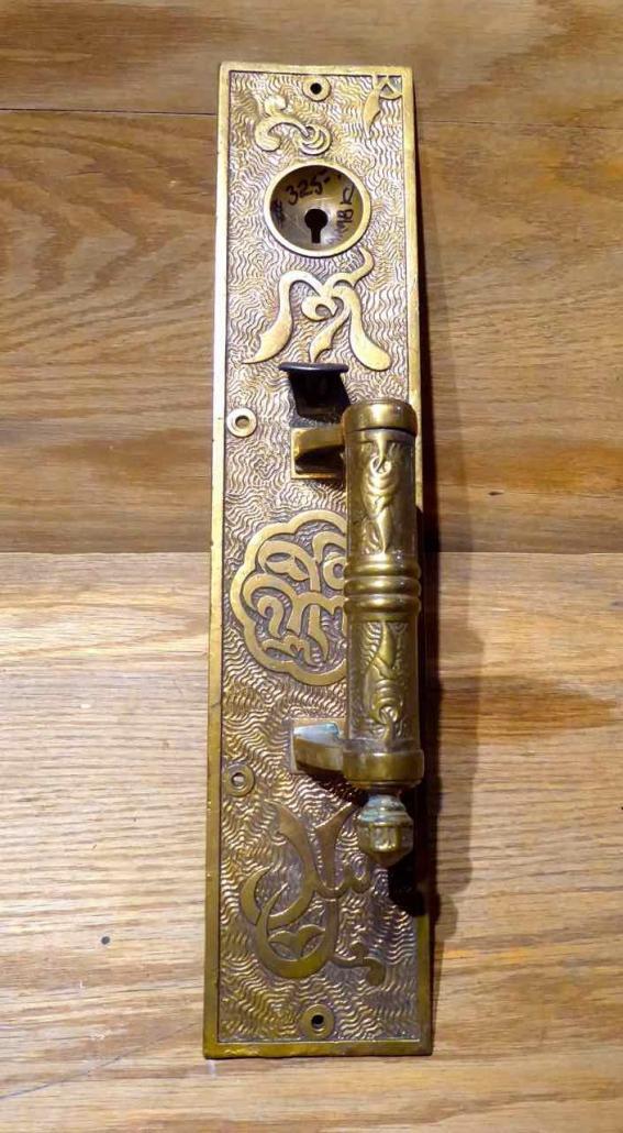 Eastlake style cast brass thumblatch entry set with extraordinary detailed design work.