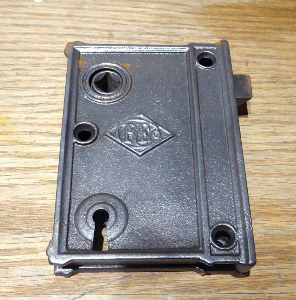 Antique cast iron rim locks, manufactured and signed on both sides with Russell & Erwin makers mark. Features: reversible, can be keyed, optional privacy latch.