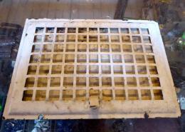Antique steel wall grate (missing back). 