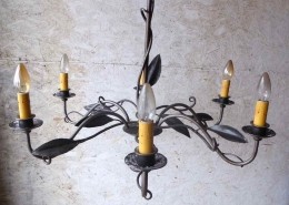 Art Nouveau style wrought iron six light chandelier, handmade by local craftsman.