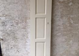 Old antique solid door with three panels