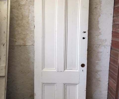 Old four panel solid door