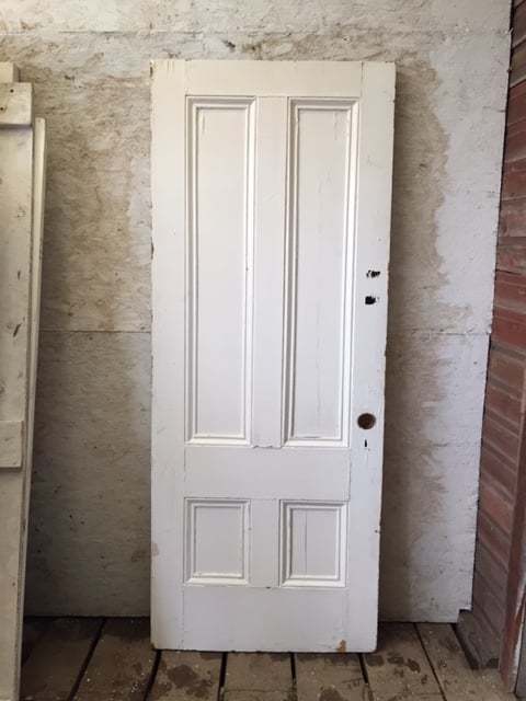 Old four panel solid door