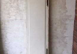 Tall and slender antique single solid door