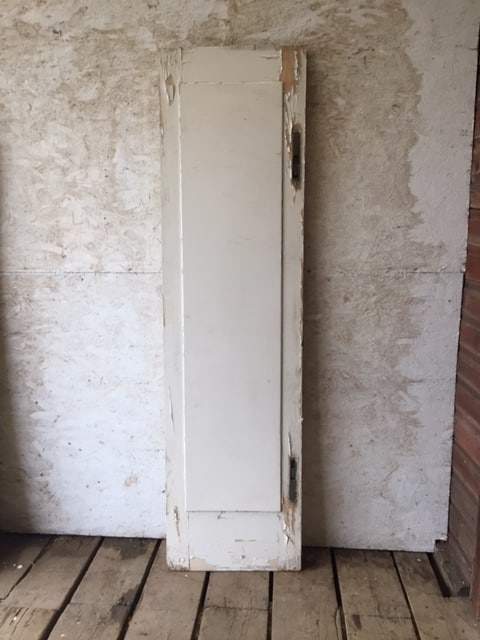 Tall and slender antique single solid door