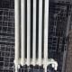 Antique water radiator with six fins.