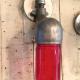 Vintage mid-century industrial sconce light with red glass