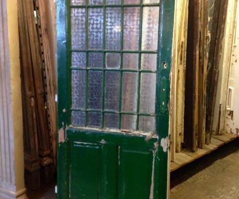 Single Door with multiple glass panes and two panels.