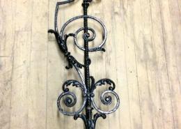 24 matching antique cast iron balusters