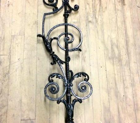 24 matching antique cast iron balusters